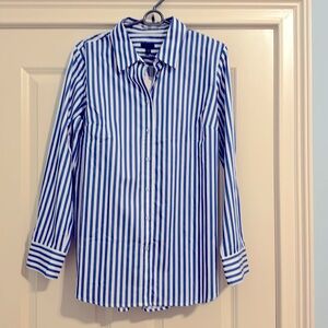 New!!! Blue and white stripped shirt w 4 buttons on each side.